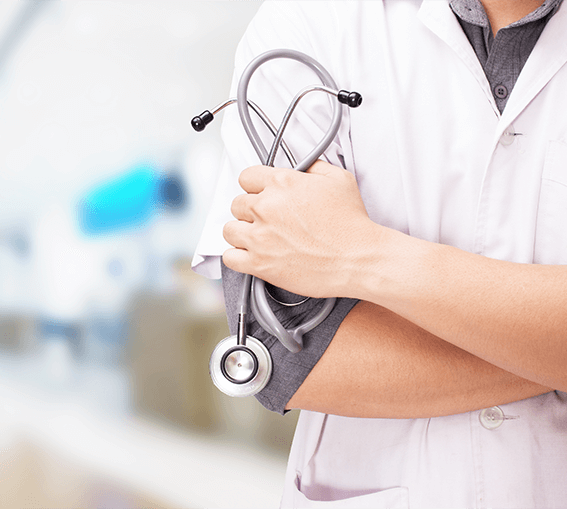 A doctor holds a stethoscope, ready to examine a patient, symbolizing healthcare and medical professionalism.